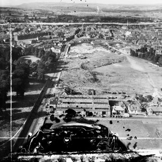 Falkirk, general view, showing Millars Garage, Callendar Road and Bellsmeadow.  Oblique aerial photograph taken facing west.  This image has been produced from a damaged and crop marked negative.