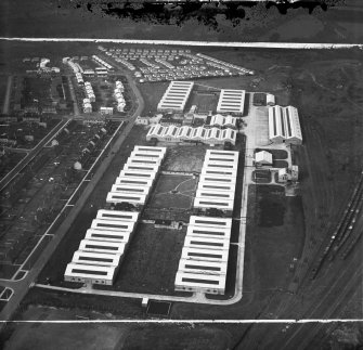 Newton Victor Ltd. Works, Watling Street, Motherwell.  Oblique aerial photograph taken facing west.  This image has been produced from a damaged and crop marked negative.