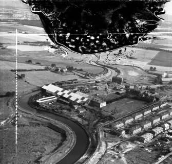 Lambhill Ironworks, Strachur Street and Possil Loch, Glasgow.  Oblique aerial photograph taken facing north-east.  This image has been produced from a damaged and crop marked negative.