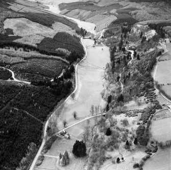 Drumtochty Castle and St Palladius' Episcopal Church, Glen of Drumtochty, Auchenblae.  Oblique aerial photograph taken facing west.