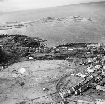 Oban, general view, showing Railway Quay and Ardantrive Bay, Kerrera.  Oblique aerial photograph taken facing north.