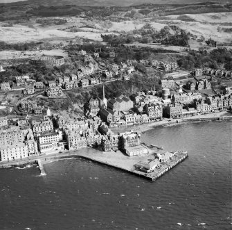 Oban, general view, showing North Pier and McCaig's Tower.  Oblique aerial photograph taken facing east.