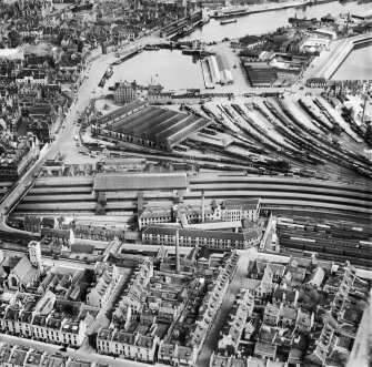 Aberdeen, general view, showing Wiggins Teape Ltd. Pirie Appleton and Co. Paper Mills, College Street and Upper Dock.  Oblique aerial photograph taken facing north-east.