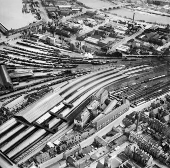 Wiggins Teape Ltd. Pirie Appleton and Co. Paper Mills, College Street and Aberdeen Joint Railway Station, Aberdeen.  Oblique aerial photograph taken facing south-east.