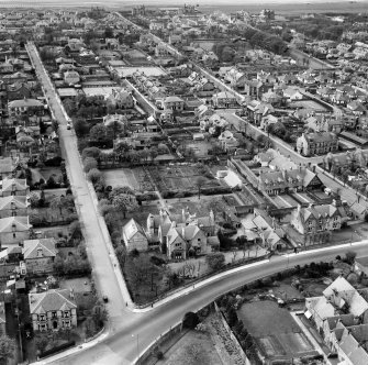 Ayr, general view, showing Carrick House, Carrick Road and Broomfield Road.  Oblique aerial photograph taken facing north-west.