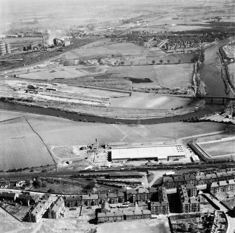 Glasgow, general view, showing Hoover (Electric Motors) Ltd. Cambuslang Works, Somervell Street and Cambuslang Road.  Oblique aerial photograph taken facing north-east.