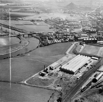 Glasgow, general view, showing Hoover (Electric Motors) Ltd. Cambuslang Works, Somervell Street and Cambuslang Bridge.  Oblique aerial photograph taken facing east.  This image has been produced from a crop marked negative.