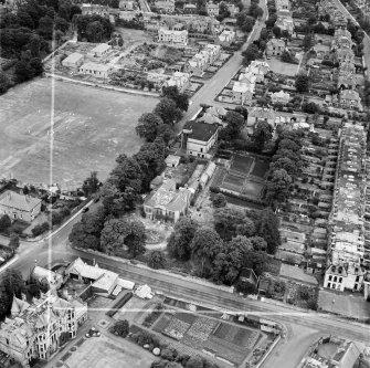 Edinburgh, general view, showing William Younger and Co. Ltd. Artesian Wells, Grange Loan and Carlton Cricket Ground.  Oblique aerial photograph taken facing north-east.  This image has been produced from a crop marked negative.