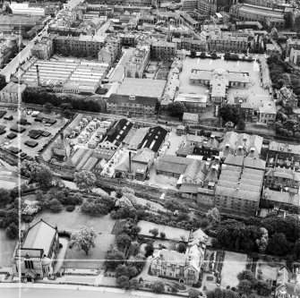 William Younger and Co. Ltd. Canonmills Maltings and Cooperage, Glenogle Road and Edinburgh Academy, Henderson Row, Edinburgh.  Oblique aerial photograph taken facing south.  This image has been produced from a crop marked negative.