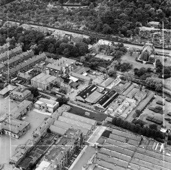 William Younger and Co. Ltd. Canonmills Maltings and Cooperage, Glenogle Road and Royal Botanic Garden, Edinburgh.  Oblique aerial photograph taken facing north.  This image has been produced from a crop marked negative.