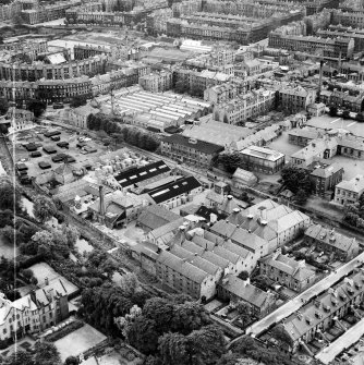 Edinburgh, general view, showing William Younger and Co. Ltd. Canonmills Maltings and Cooperage, Glenogle Road and Brandon Street.  Oblique aerial photograph taken facing south-east.  This image has been produced from a crop marked negative.