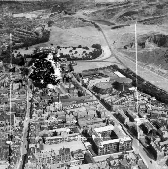 Edinburgh, general view, showing William Younger and Co. Ltd. Holyrood Brewery and Holyrood Park.  Oblique aerial photograph taken facing east.  This image has been produced from a damaged and crop marked negative.