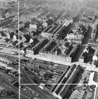 Glasgow, general view, showing Arbuckle, Smith and Co. Bonded Warehouse, Stanley Street and Kinning Park Goods Station.  Oblique aerial photograph taken facing north.  This image has been produced from a damaged and crop marked negative.