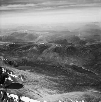 Loch na Caoidhe and Sgurr Coire nan Eun, Strathconon Forest.  Oblique aerial photograph taken facing north-west.