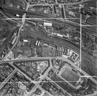 Stewarts and Lloyds Ltd. Works, Main Street and Albion Rovers Football Ground, Coatbridge.  Oblique aerial photograph taken facing south.  This image has been produced from a crop marked negative.