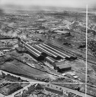 Coatbridge, general view, showing Stewarts and Lloyds Ltd. Calder Tube Works and Victoria Iron and Steel Works.  Oblique aerial photograph taken facing north-west.  This image has been produced from a crop marked negative.