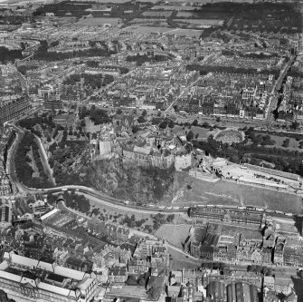 Edinburgh, general view, showing Edinburgh Castle and Princes Street.  Oblique aerial photograph taken facing north-west.
