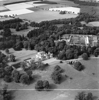 Oxenfoord Castle School and Walled Garden, Pathhead.  Oblique aerial photograph taken facing west.  This image has been produced from a crop marked negative.