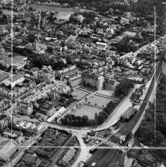 Pitlochry, general view, showing Fisher's Hotel, Atholl Road and Pitlochry Station.  Oblique aerial photograph taken facing east.  This image has been produced from a crop marked negative.