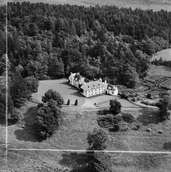 Balvarran House, Kirkmichael.  Oblique aerial photograph taken facing east.  This image has been produced from a crop marked negative.
