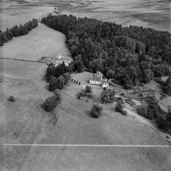 Balvarran House, Kirkmichael.  Oblique aerial photograph taken facing north-east.  This image has been produced from a crop marked negative.