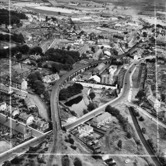 Barrhead, general view, showing West Arthurlie Bleach Works, Kelburn Street and Barnes Street.  Oblique aerial photograph taken facing north.  This image has been produced from a crop marked negative.