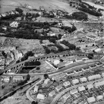 Barrhead, general view, showing West Arthurlie Bleach Works, Kelburn Street and Chappell House.  Oblique aerial photograph taken facing north.  This image has been produced from a crop marked negative.