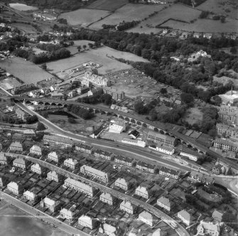 Barrhead, general view, showing West Arthurlie Bleach Works, Kelburn Street and Levern Crescent.  Oblique aerial photograph taken facing west.  This image has been produced from a crop marked negative.