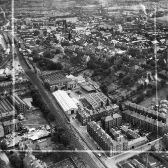 Paisley, general view, showing Scottish Wool Growers Ltd. Underwood Wool Stores, Brown Street and George A Clark Town Hall, Gauze Street.  Oblique aerial photograph taken facing south-east.  This image has been produced from a crop marked negative.