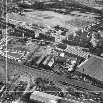 British Dyewood Co. Ltd. Carntyne Dyewood Mills, Shettleston Road and Tollcross Park, Glasgow.  Oblique aerial photograph taken facing south.  This image has been produced from a crop marked negative.
