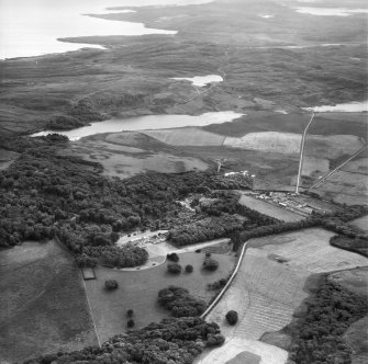 Colonsay, general view, showing Colonsay House, Kiloran and Loch Fada.  Oblique aerial photograph taken facing south.