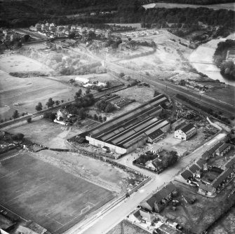 Blantyre, general view, showing Blantyre Engineering Co. Ltd. Works, John Street and Blantyre Public Park.  Oblique aerial photograph taken facing north.