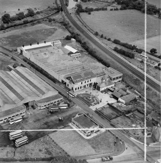 M and C Switchgear Ltd. Kelvinside Works, Kirkintilloch.  Oblique aerial photograph taken facing north.  This image has been produced from a crop marked negative.