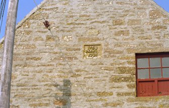 View of the date stone on SSW gable end of mill