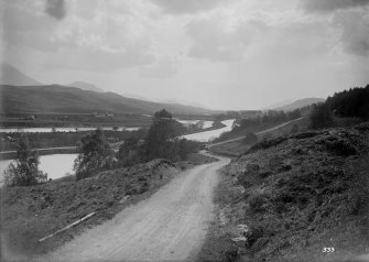General view of canal (swing bridge is obscured by trees) and valley of the Lochy
Negative bag titled: 'Caledonian Canal, Valley of the Lochy'