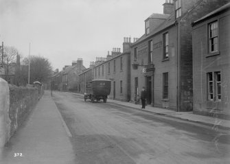 View of street in Dalmellington from North-West.
