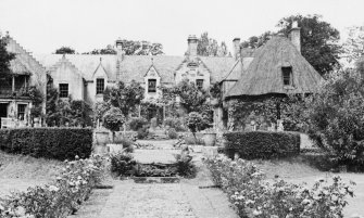 Postcard view of Barony House and garden.