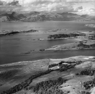 Isle of Eriska, general view, showing Eriska House and Airds Bay.  Oblique aerial photograph taken facing north.