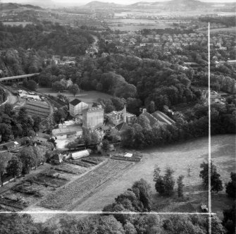 Edinburgh, general view, showing A and R Scott Ltd. West Mills, West Mill Road and Woodhall Road.  Oblique aerial photograph taken facing east.  This image has been produced from a crop marked negative.