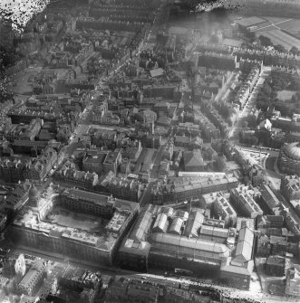 Edinburgh, general view, showing Royal Scottish Museum, Chambers Street and Nicholson Street.  Oblique aerial photograph taken facing south.  This image has been produced from a damaged negative.