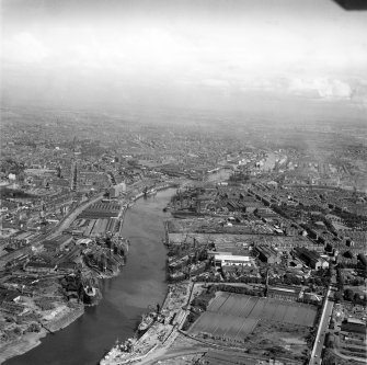 Glasgow, general view, showing Linthouse Shipyard and Meadowside Granary.  Oblique aerial photograph taken facing east.