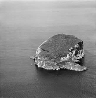Bass Rock Lighthouse and Castle.  Oblique aerial photograph taken facing north-east.