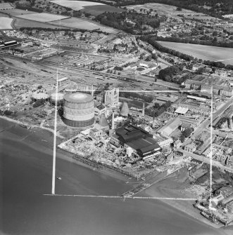 Oblique aerial photograph taken facing north showing Alloa Glass Works and Alloa Gas Works in 1952.  
This image has been produced from a crop marked negative.