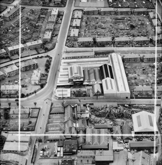 Lawside Engineering and Foundry Co. Ltd. and McGregor and Balfour Ltd. North Tay Works, Loon's Road, Dundee.  Oblique aerial photograph taken facing south.  This image has been produced from a crop marked negative.
