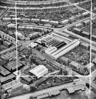 Lawside Engineering and Foundry Co. Ltd. and McGregor and Balfour Ltd. North Tay Works, Loon's Road, Dundee.  Oblique aerial photograph taken facing south-east.  This image has been produced from a crop marked negative.