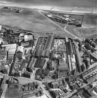 John Fleming and Co. Ltd. Timber Yard and East St Clement's Church, St Clement Street, Aberdeen.  Oblique aerial photograph taken facing north-east.