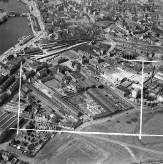 Aberdeen, general view, showing John Fleming and Co. Ltd. Timber Yard, St Clement Street and Regent Quay.  Oblique aerial photograph taken facing west.  This image has been produced from a crop marked negative.