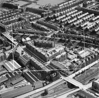 Edinburgh, general view, showing Waddie and Co. Ltd. St Stephen's Works, Slateford Road and Shandon Place.  Oblique aerial photograph taken facing east.  This image has been produced from a crop marked negative.