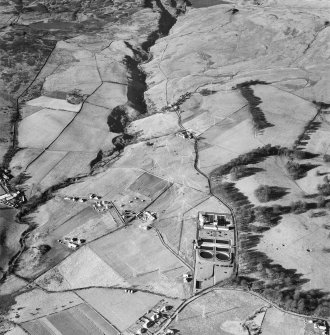 Cochno Filters, Cochno Road and Loch Humphrey Burn, Cochno.  Oblique aerial photograph taken facing north-west.  This image has been produced from a damaged negative.