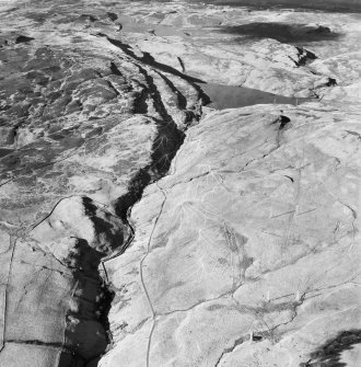 Greenside Reservoir and Loch Humphrey Burn, Kilpatrick Hills.  Oblique aerial photograph taken facing north-west.  This image has been produced from a damaged negative.